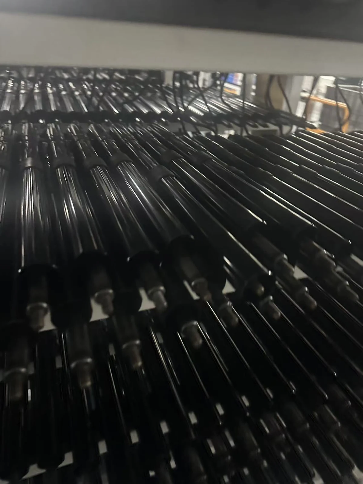 Close view of support struts on workshop racks